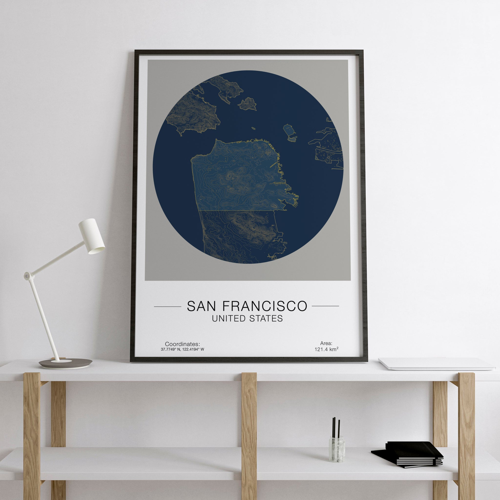 Circular San Francisco map artwork in a golden frame.