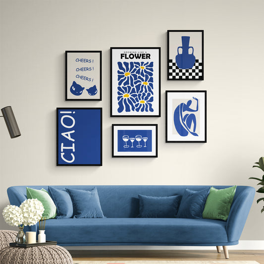 Abstract canvas art with bold blue flowers and playful text.