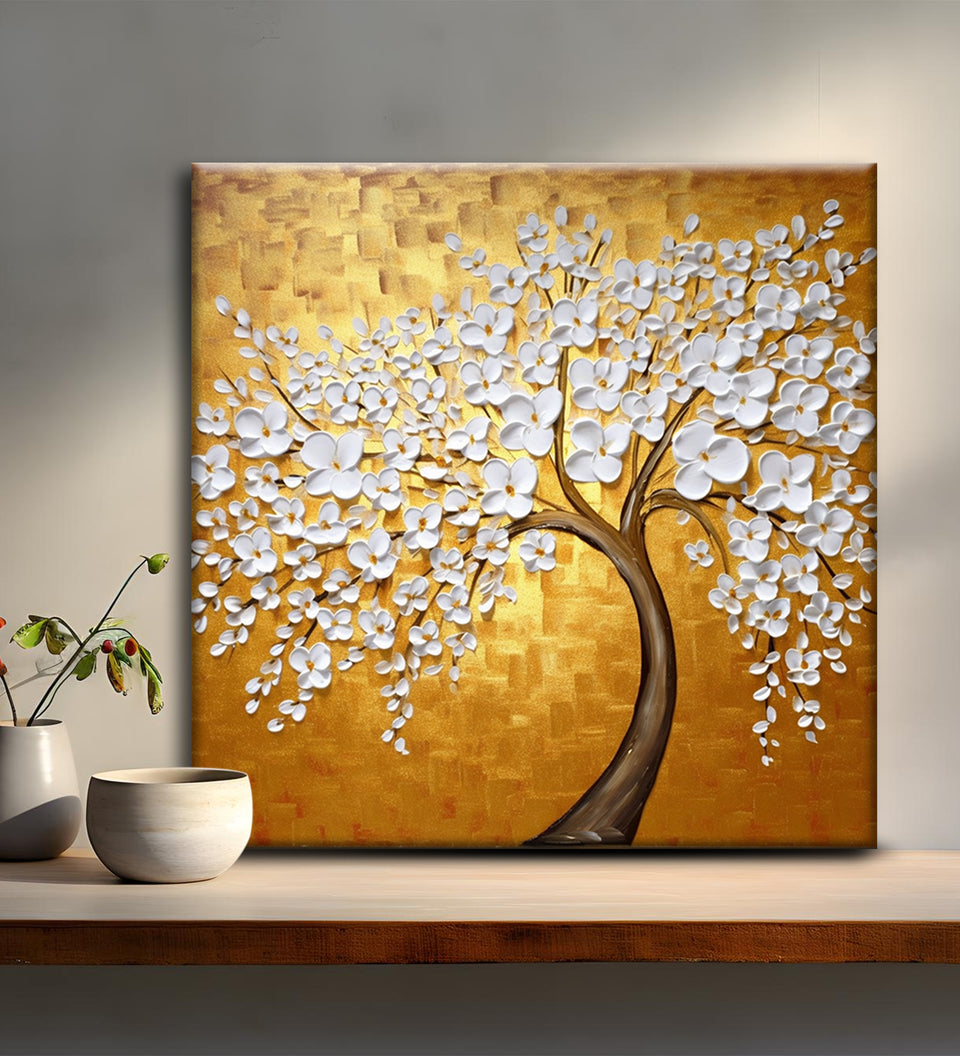 Painting of a Majestic White Flowering Tree on a Gleaming Gold Canvas