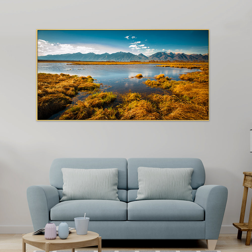 Tranquil lake mirrors majestic mountains on canvas.