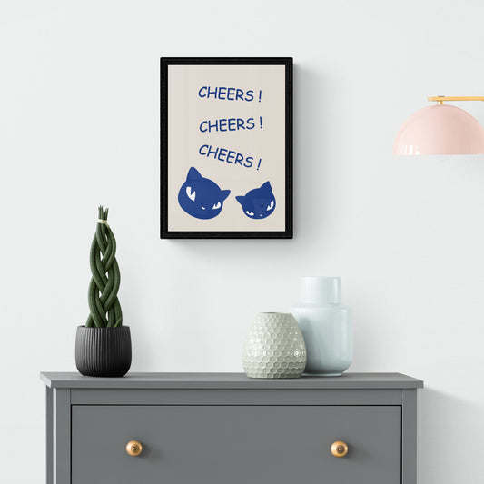 Canvas art of two cats clinking glasses with "Cheers!" text.