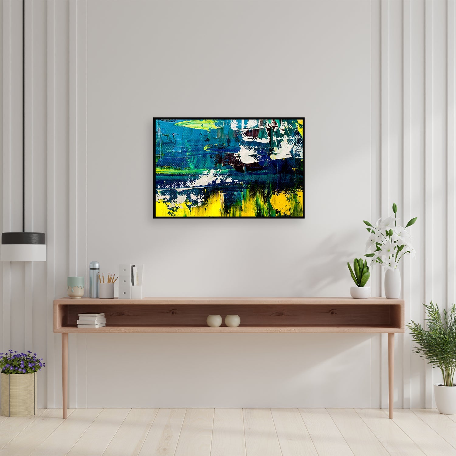 Large abstract landscape painting in blue, green, yellow, and white.